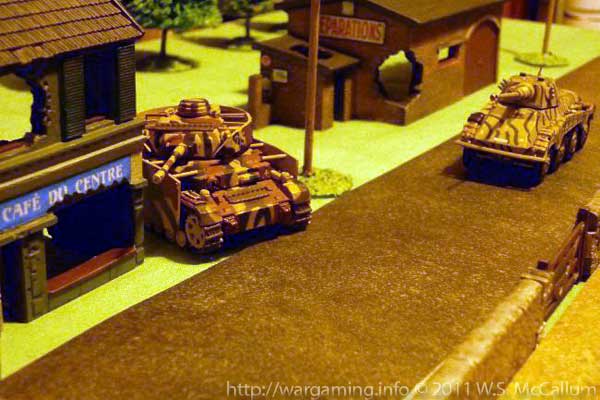 The Panzer IV skulks behind the Airfix bombed-out café!