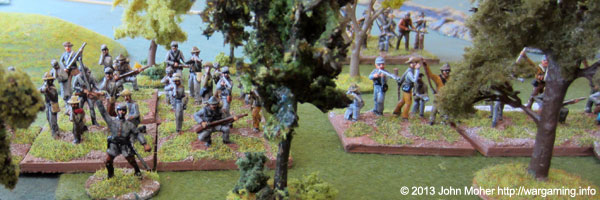 Confederates advance through the woodland towards the Cornfields.