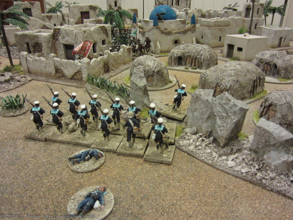 The Naval Brigade rapidly withdraws from the slums, at the sight of the Dervish Cavalry