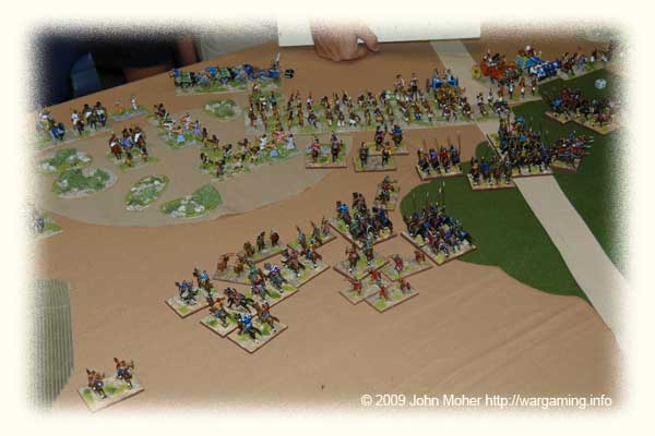 The Chionites & Light Infantry on the left have completed 2 bounds of feigned flight and the rest of the Kushan army is attacking in a disorganised mass towards the centre and right.