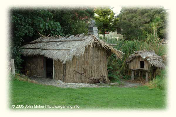 Replica of a local (as often Maori as European) Reed Cutter's Raupo as would be found amongst the European Settlements - like the Mail Runner's above it is fairly substantial including glass windows, a door and a fireplace, but like all Raupo's it has an earth floor and if badly sited could no doubt flood in heavy rain and such like.