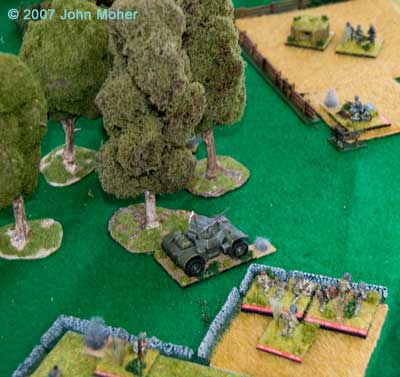 A Daimler Armoured Car and a Mortar FO move up to deal with the thickening German defence.