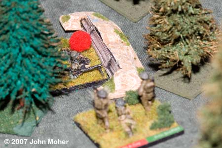Elements of No.3 Platoon infiltrate a wooded German position.