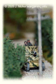 A Lorraine Schlepper Marder I moves cautiously down a Normandy "Bocage Country" hedge lined lane.