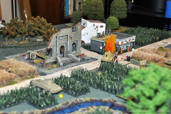 Late in Game 2 Late in Game 2 - the Sd.Kfz 234/1 is still bogged in the field and (the British) '3' Platoon is in the ruined building and the orchard in the German rear - click to see more.