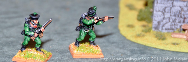 Chosen Man Cooper followed by Riflemen Harris advance in the Song of Drums and Shakos game.