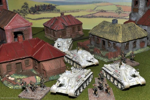 Forces of Valor SU-122's work their way though a Russian Town Forces of Valor SU-122's work their way though a Russian Town.