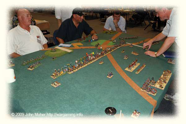 Our Kushan's (with Campbell on right) take on the Medieval Portuguese (Richard 'Uncle Dickie' Foster on left, Ivan Truong in centre), while Andrew Fergus observes from the far table corner! Our Kushan's (with Campbell on right) take on the Medieval Portuguese (Richard 'Uncle Dickie' Foster on left, Ivan Truong in centre), while Andrew Fergus observes from the far table corner!