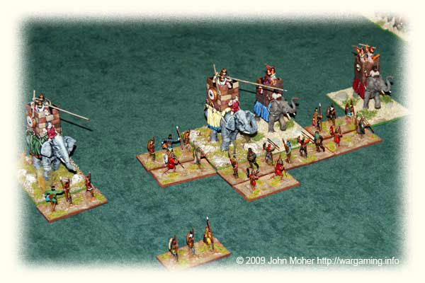 The Auxilia start to take care of the Exploding Elephants - they eventually dealt with all of them except the one on the far right which charged right through the Kushan lines and had to be pursued and finished off by a couple of Lh(S) from Cam's right flank command. The Auxilia start to take care of the Exploding Elephants.