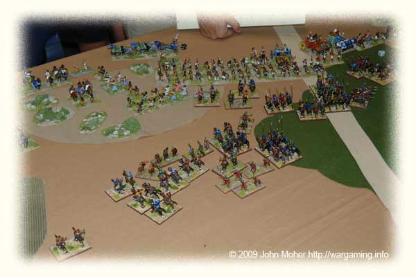 The Chionites & Light Infantry on the left have completed 2 bounds of feigned flight and the rest of the Kushan army is attacking in a disorganised mass towards the centre and right. The Chionites & Light Infantry on the left have completed 2 bounds of feigned flight and the rest of the Kushan army is attacking in a disorganised mass towards the centre and right.