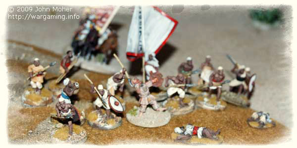 The original Dervish Band (from the 2nd 'Red Flag' Rub) gets pasted by Gatling & Rifle fire while pinned on the crest line of one of the hills; they take heavy casualties despite (in game terms) being prone (a result of the pinned effect from their failed charge). Amir Raslan is in the background trying to rally his Ansars.