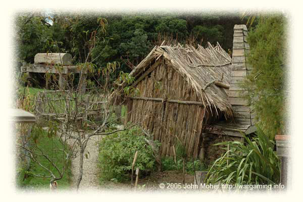This is an example of a more substantial Raupo - it's a replica of the Howick Village Mail Runner's, who lived next to the post master, and includes a fireplace of sod-brick with a wooden slate chimney, a solid door, and full frames with glass in all the windows! In the background is a log sawing stand from a sawmill. This is an example of a more substantial Raupo - it's a replica of the Howick Village Mail Runner's, who lived next to the post master, and includes a fireplace of sod-brick with a wooden slate chimney, a solid door, and full frames with glass in all the windows! In the background is a log sawing stand from a sawmill.
