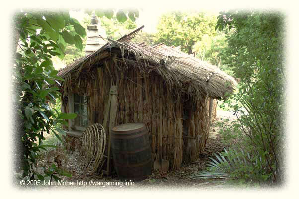 The rear of the Reed Cutters Raupo - most notable the large Eel trap! Reed Cutters would tend to live close to the River or Marsh that was their source of Bull Rush, so naturally they would have made use of that resource to supplement their livelihood by fishing, trapping eels, and so on... The rear of the Reed Cutters Raupo - most notable the large Eel trap! Reed Cutters would tend to live close to the River or Marsh that was their source of Bull Rush, so naturally they would have made use of that resource to supplement their livelihood by fishing, trapping eels, and so on...