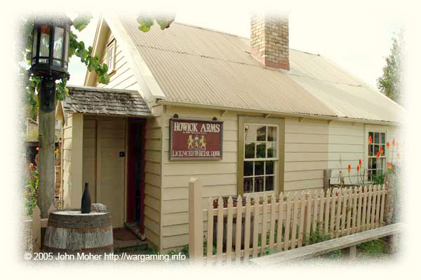 This Fencible cottage has actually been turned into a pub! It'd be a pretty small one, perhaps 4 people could fit inside at the bar! So you could imagine on a Saturday night it'd be pretty raucous outside and you'd not want to be the neighbours! This cottage has a corrugated iron roof so has either been upgraded or was one of the later ones built (corrugated iron started to become common in New Zealand construction in the 1870s & 1880s, a bit after the end of the Maori-European Wars period so not ideal for wargaming terrain, although if all the buildings in HHV have authentic roofs it appears to have first appeared on a few buildings around 1860). This Fencible cottage has actually been turned into a pub! It'd be a pretty small one, perhaps 4 people could fit inside at the bar! So you could imagine on a Saturday night it'd be pretty raucous outside and you'd not want to be the neighbours! This cottage has a corrugated iron roof so has either been upgraded or was one of the later ones built (corrugated iron started to become common in New Zealand construction in the 1870s & 1880s, a bit after the end of the Maori-European Wars period so not ideal for wargaming terrain, although if all the buildings in HHV have authentic roofs it appears to have first appeared on a few buildings around 1860).