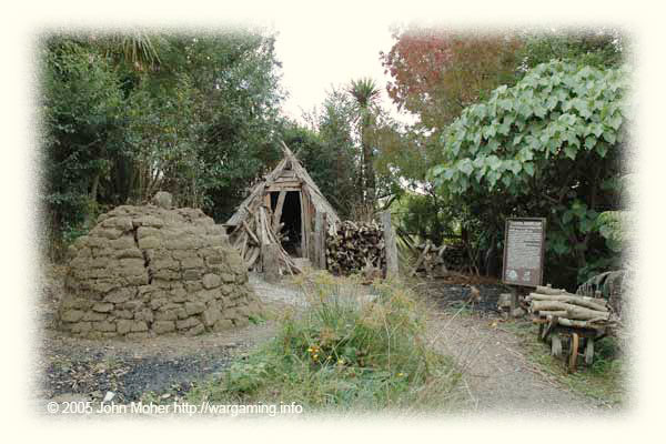 A typical Charcoal Burners Camp showing the kiln and the burner's temporary shelter - he'd need to stay here with the kiln for several days before being able to open it and unpack the burnt Titree into bags. A typical Charcoal Burners Camp showing the kiln and the burner's temporary shelter - he'd need to stay here with the kiln for several days before being able to open it and unpack the burnt Titree into bags.