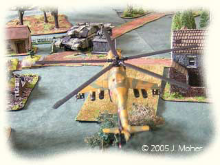 Mi-24 Hind D targets a Challenger MBT. Mi-24 Hind D targets a Challenger MBT.