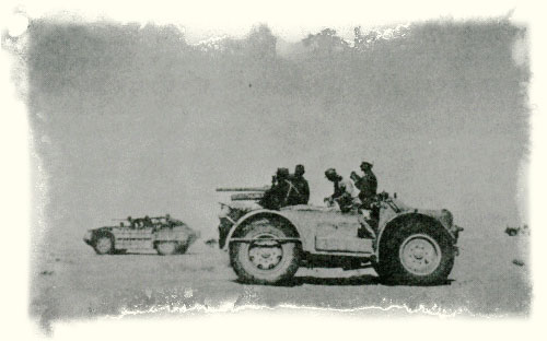 This photo clearly shows three vehicles from the original "Raggruppamento Sahariano AS", the nearer is the SPA TL37 Camionetta AS mounting the 47/32 Anti-Tank Gun, the further vehicle is a Sahariana, probably 790 B, 792 B, or 798 B as it appears to mount a 20mm and a single MG, and finally in the right distance can be seen a second Sahariana. This photo clearly shows three vehicles from the original "Raggruppamento Sahariano AS", the nearer is the SPA TL37 Camionetta AS mounting the 47/32 Anti-Tank Gun, the further vehicle is a Sahariana, probably 790 B, 792 B, or 798 B as it appears to mount a 20mm and a single MG, and finally in the right distance can be seen a second Sahariana.