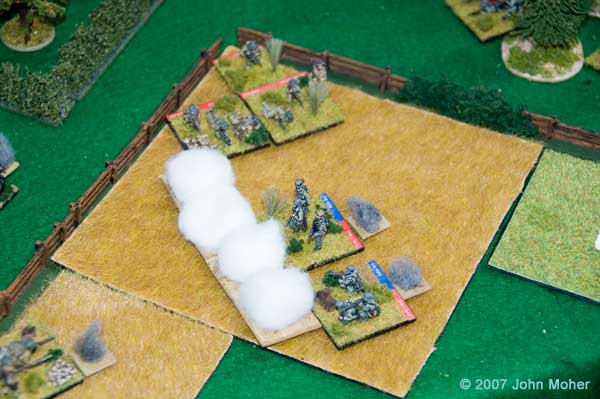 Uh Oh! As the 3" Mortar Section fires the last of it's smoke, the German MMG Bunker is overrun by a Close Assault and the remains of the German Platoon are caught in a pincer. Uh Oh! As the 3" Mortar Section fires the last of it's smoke, the German MMG Bunker is overrun by a Close Assault and the remains of the German Platoon are caught in a pincer.