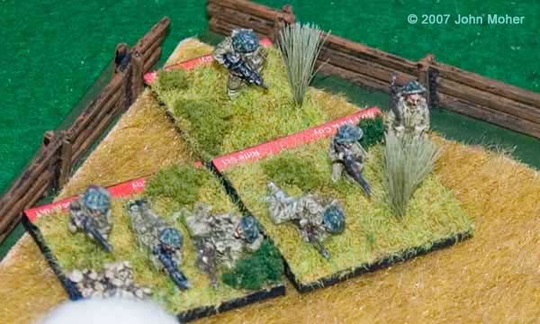 Close up of 2 Platoon (from above photos) after assaulting & eliminating the German MMG Bunker. Close up of 2 Platoon (from above photos) after assaulting & eliminating the German MMG Bunker.