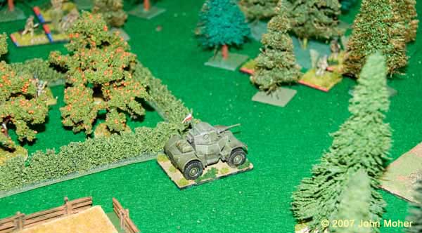 Just before the end the remains of the British Company (6 Rifle Sections and the original Daimler) push forward towards the centre rear of the German position. Just before the end the remains of the British Company (6 Rifle Sections and the original Daimler) push forward towards the centre rear of the German position.