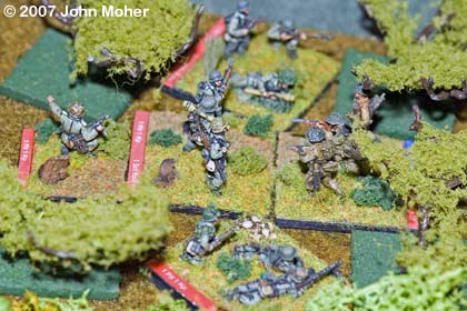 The assault goes in, SS Platoon 1 assaults the exposed British Rifle Section. The assault goes in, SS Platoon 1 assaults the exposed British Rifle Section.