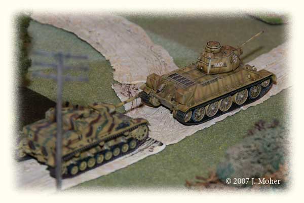 The other 10th SS Panzer Platoon finally moves on, a captured T-34/76 Mod.41 (from Poland) leads a StuG IV up the main road. In the end they weren't to advance any further all afternoon! The other 10th SS Panzer Platoon finally moves on, a captured T-34/76 Mod.41 (from Poland) leads a StuG IV up the main road. In the end they weren't to advance any further all afternoon!
