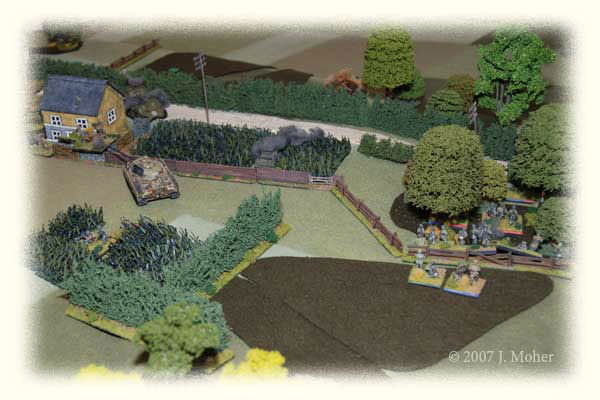 As the game concluded - the Panther is attempting to pound the Scots in the Farmhouse at point blank range, a couple of platoons of SS Infantry are on the ridge preparing to advance along it with more on the lower slopes of the ridge (in the field). It's only a matter of time... As the game concluded - the Panther is attempting to pound the Scots in the Farmhouse at point blank range, a couple of platoons of SS Infantry are on the ridge preparing to advance along it with more on the lower slopes of the ridge (in the field). It's only a matter of time...