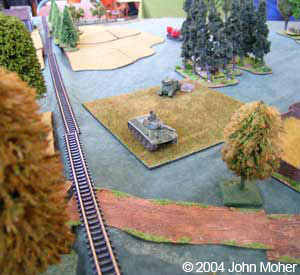 The third T-34 pursues the disappearing Tigers. The third T-34 pursues the disappearing Tigers.